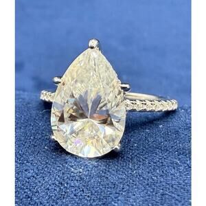4CT Moissanite Pear cut Solitaire sterling silver size 7